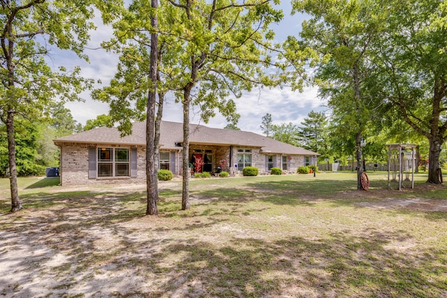 6444 Welannee Blvd, Laurel Hill, FL 32567 - view of front of property with brick siding and a front lawn