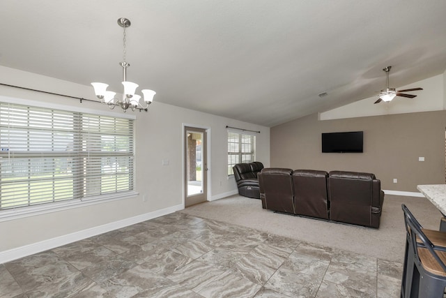 2365 Genevieve Way, Crestview, FL 32536 - living room with baseboards, vaulted ceiling, and ceiling fan with notable chandelier