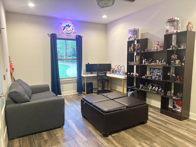 office space with recessed lighting, baseboards, and wood finished floors