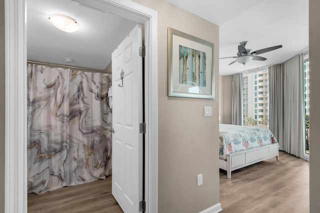 bedroom featuring wood finished floors