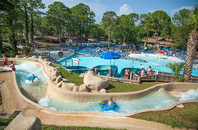 view of swimming pool featuring a water play area