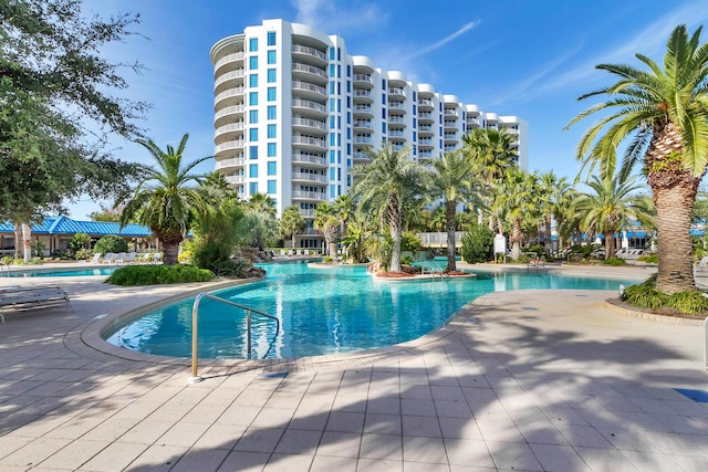 community pool featuring a patio area