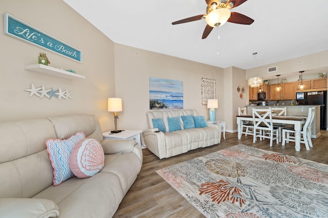 4203 Indian Bayou Trl Unit 1503, Destin, FL 32541 - living room with light wood-type flooring, a ceiling fan, and baseboards