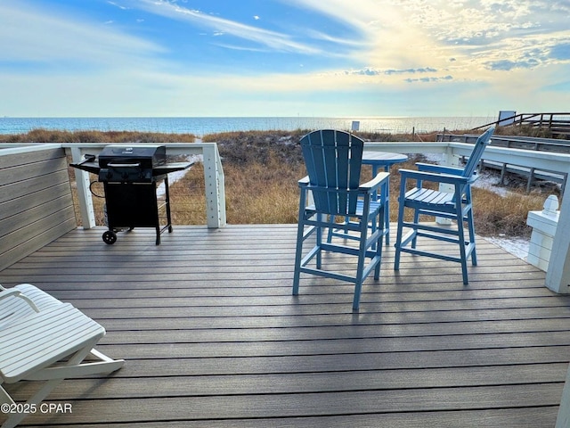 9614 Beach Blvd Unit D, Panama City Beach, FL 32408 - deck with a water view and a grill