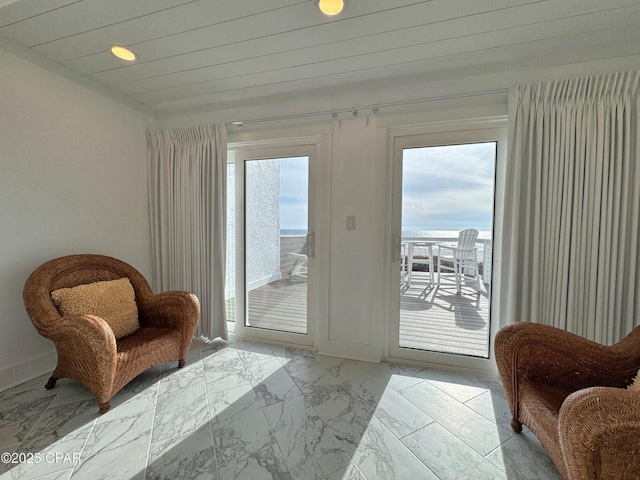 9614 Beach Blvd Unit D, Panama City Beach, FL 32408 - doorway with recessed lighting, baseboards, and marble finish floor
