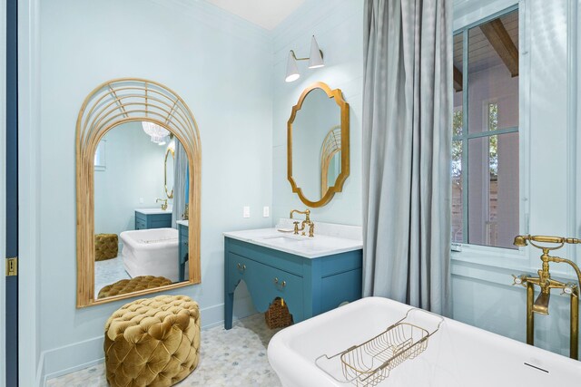 50 Camellia St, Santa Rosa Beach, FL 32459 - full bath with a freestanding bath, vanity, ornamental molding, and baseboards