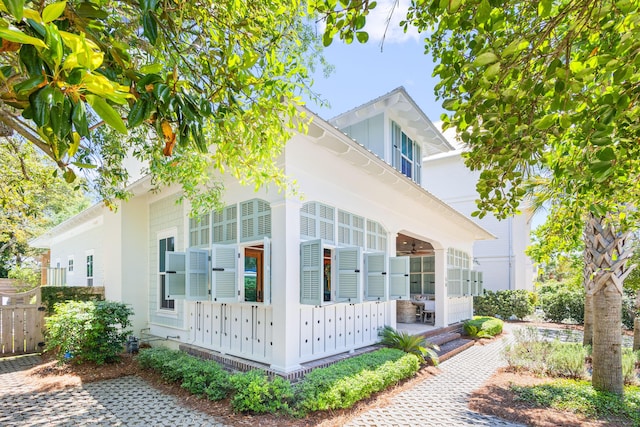50 Camellia St, Santa Rosa Beach, FL 32459 - view of side of property with mail area and fence