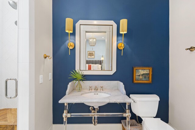 50 Camellia St, Santa Rosa Beach, FL 32459 - full bath featuring a stall shower, toilet, and a sink