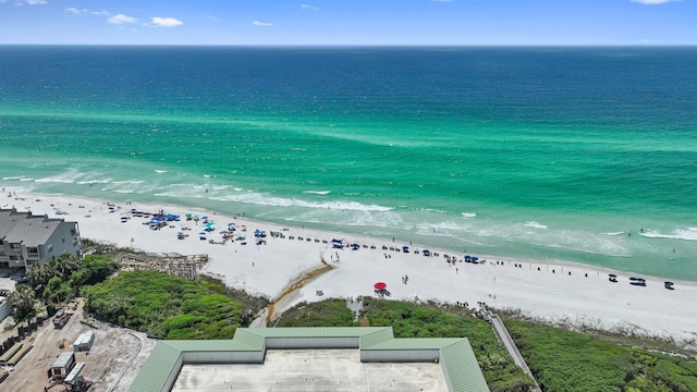 drone / aerial view of waterfront with a beach