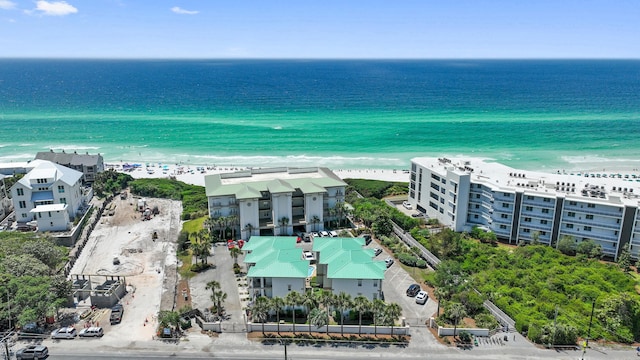 drone / aerial view of waterfront with a beach