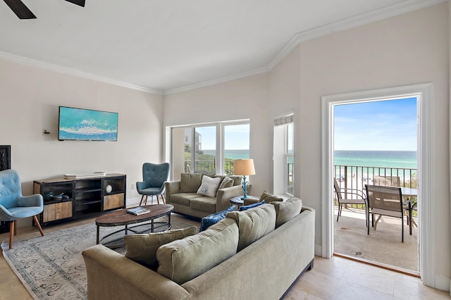 living room with a water view, crown molding, and ceiling fan