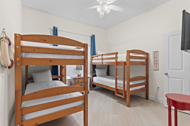 bedroom featuring baseboards