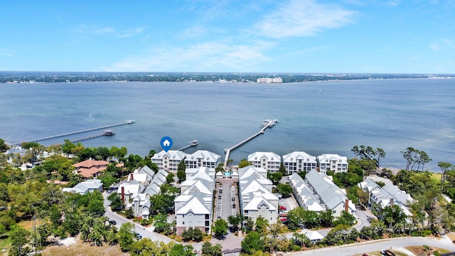 bird's eye view featuring a water view and a residential view