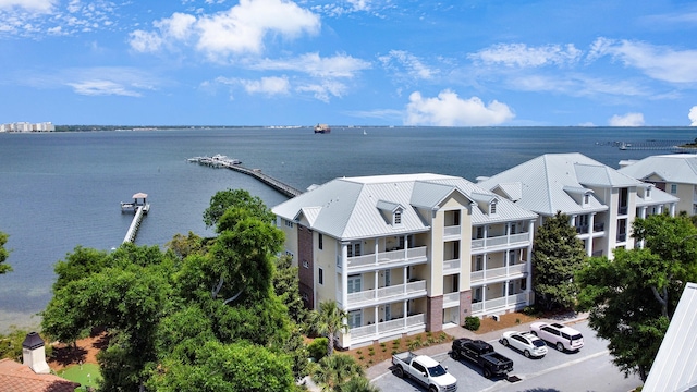 birds eye view of property featuring a water view