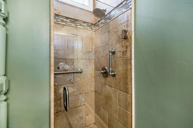 bathroom featuring a shower stall