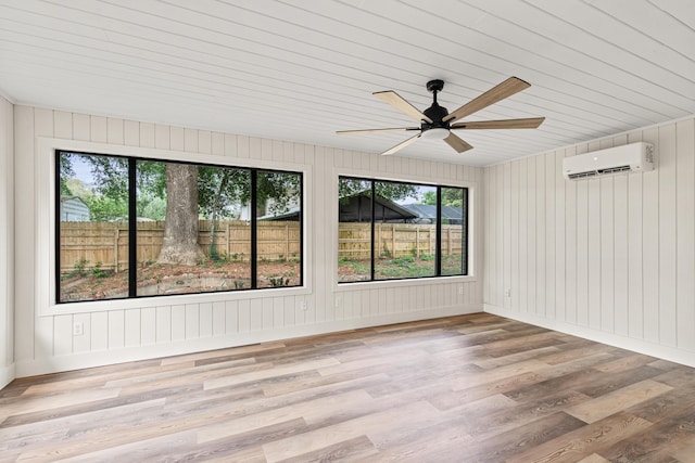 interior space featuring an AC wall unit
