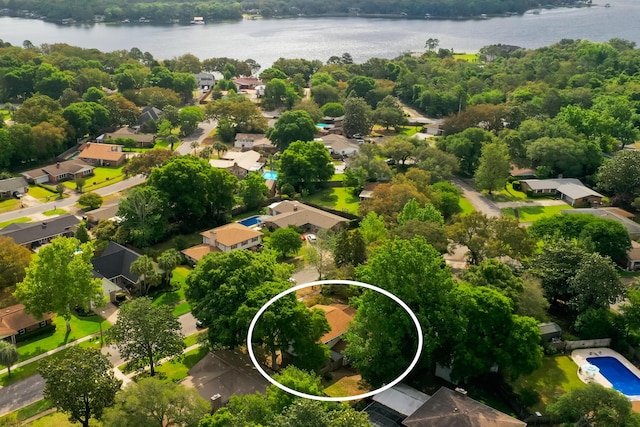 bird's eye view featuring a water view and a residential view