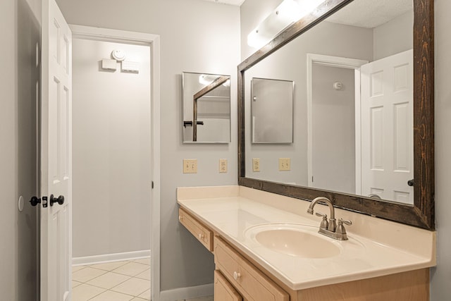 1501 Royal Palm Dr, Niceville, FL 32578 - bathroom with tile patterned flooring, vanity, and baseboards