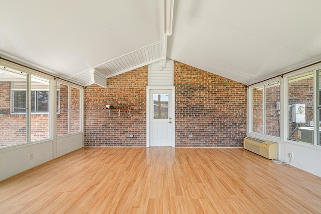 1501 Royal Palm Dr, Niceville, FL 32578 - unfurnished sunroom featuring brick wall, wood finished floors, and a wall unit AC