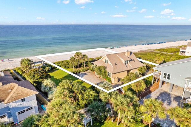 bird's eye view featuring a beach view and a water view