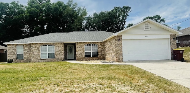437 Hatchee Dr, Crestview, FL 32536 - ranch-style home featuring an attached garage, a front yard, driveway, brick siding, and roof with shingles
