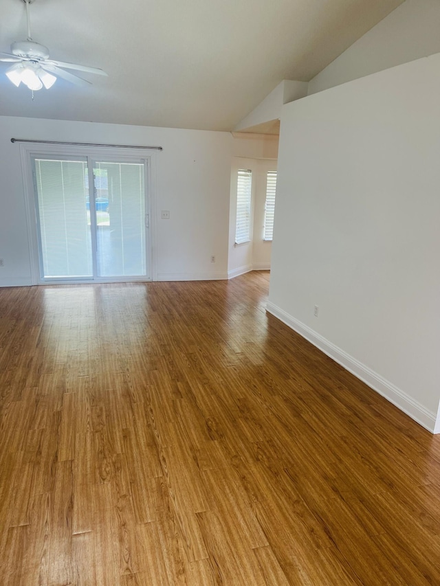 437 Hatchee Dr, Crestview, FL 32536 - unfurnished room with vaulted ceiling, light wood finished floors, a ceiling fan, and baseboards