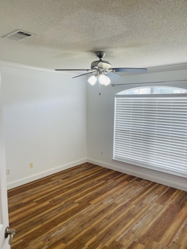 437 Hatchee Dr, Crestview, FL 32536 - empty room featuring wood finished floors, ceiling fan, a textured ceiling, and baseboards