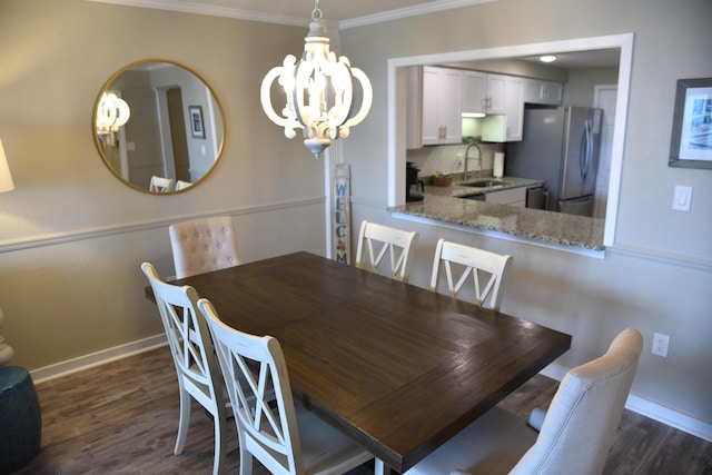 900 Gulf Shore Dr Unit 3042, Destin, FL 32541 - dining room with ornamental molding, dark wood-style floors, a chandelier, and baseboards
