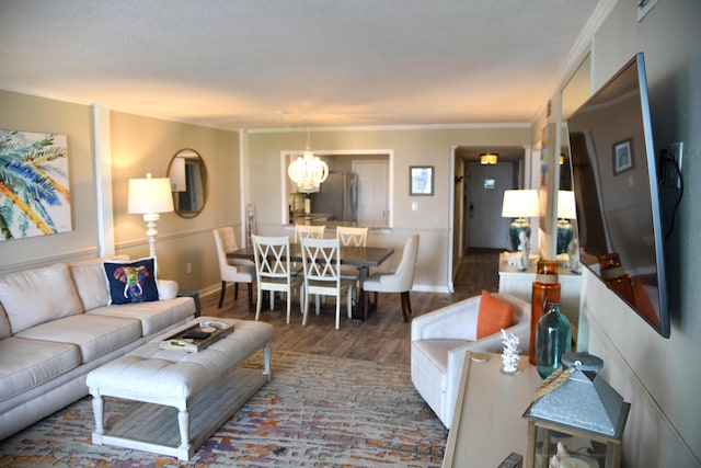 900 Gulf Shore Dr Unit 3042, Destin, FL 32541 - living area featuring a chandelier, crown molding, wood finished floors, and baseboards