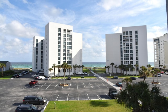 900 Gulf Shore Dr Unit 3042, Destin, FL 32541 - view of building exterior with uncovered parking and a water view