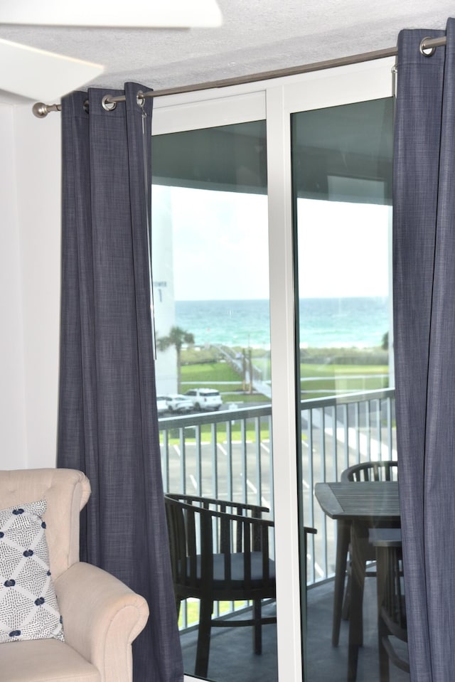 900 Gulf Shore Dr Unit 3042, Destin, FL 32541 - living room featuring healthy amount of natural light and a water view
