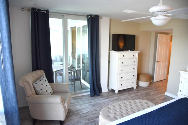 900 Gulf Shore Dr Unit 3042, Destin, FL 32541 - bedroom with access to exterior, wood finished floors, and baseboards
