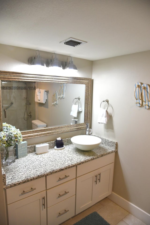 900 Gulf Shore Dr Unit 3042, Destin, FL 32541 - full bath with vanity, tile patterned flooring, a stall shower, and baseboards