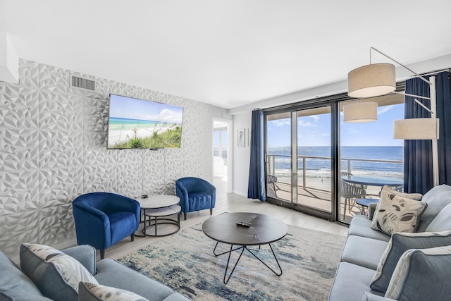 900 Gulf Shore Dr Unit 3042, Destin, FL 32541 - living area featuring wallpapered walls, light wood-type flooring, and baseboards