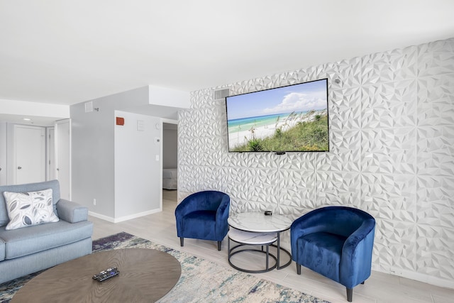 900 Gulf Shore Dr Unit 3042, Destin, FL 32541 - living area featuring wood finished floors, baseboards, an accent wall, and wallpapered walls