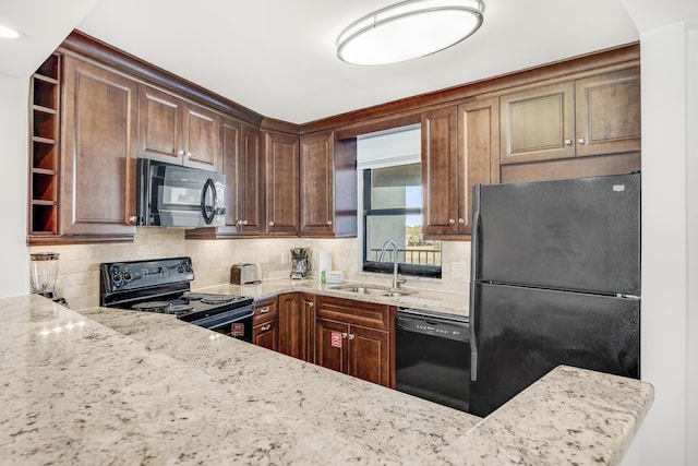900 Gulf Shore Dr Unit 3042, Destin, FL 32541 - kitchen with black appliances, a sink, decorative backsplash, open shelves, and light stone countertops