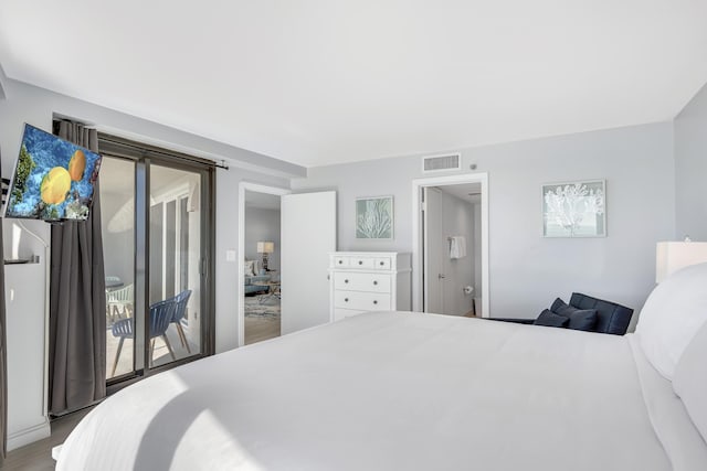 900 Gulf Shore Dr Unit 3042, Destin, FL 32541 - bedroom with access to outside and wood finished floors