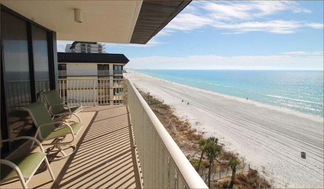 11757 Front Beach Rd Unit W600, Panama City Beach, FL 32407 - balcony featuring a water view and a beach view