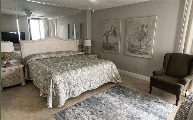 11757 Front Beach Rd Unit W600, Panama City Beach, FL 32407 - bedroom featuring baseboards and tile patterned flooring