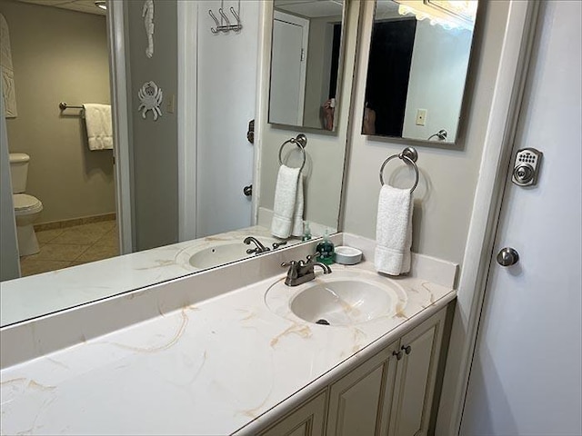 11757 Front Beach Rd Unit W600, Panama City Beach, FL 32407 - bathroom with toilet, tile patterned floors, and vanity