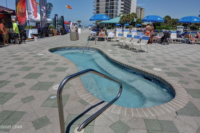 11757 Front Beach Rd Unit W600, Panama City Beach, FL 32407 - view of swimming pool featuring a patio and a pool