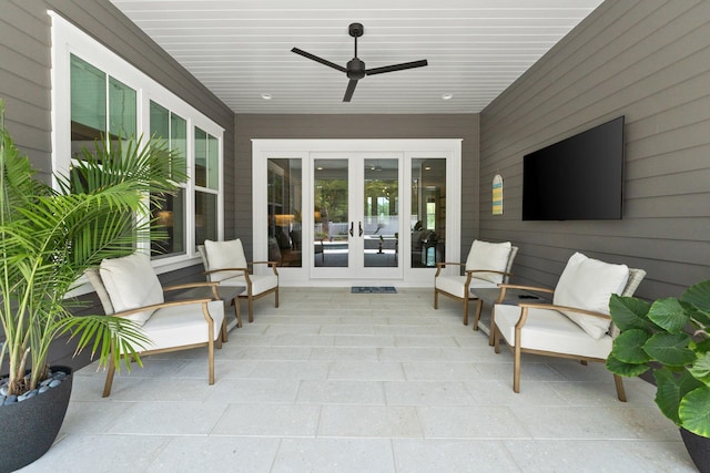 view of patio / terrace with a ceiling fan and french doors