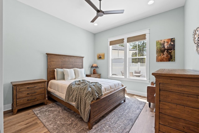 bedroom featuring recessed lighting, baseboards, and light wood finished floors