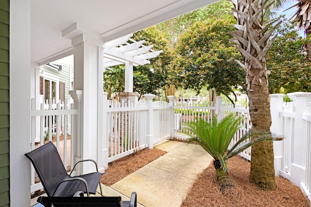 view of patio / terrace featuring fence