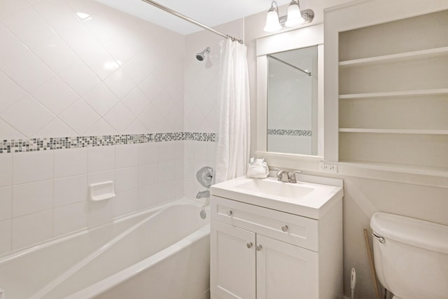 full bath with vanity, toilet, and shower / tub combo
