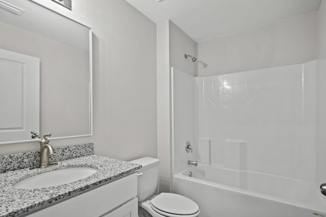 bathroom with toilet, visible vents, vanity, and shower / bathtub combination