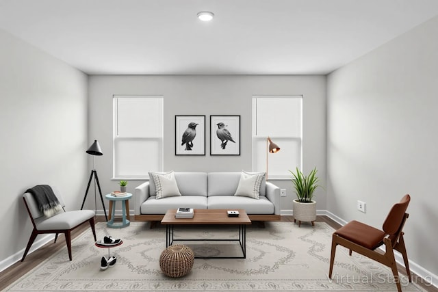 685 Whispering Creek Ave, Freeport, FL 32439 - living area featuring baseboards and wood finished floors