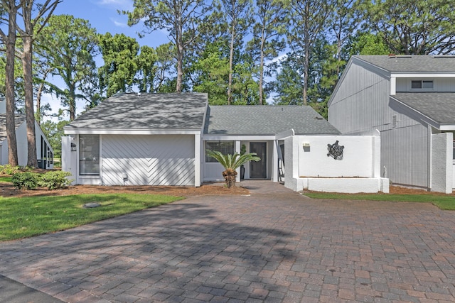 399 Linkside Dr, Miramar Beach, FL 32550 - view of front of house with roof with shingles