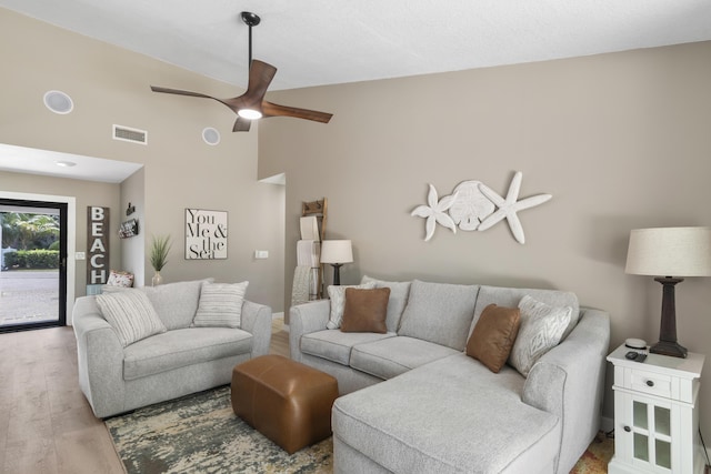 399 Linkside Dr, Miramar Beach, FL 32550 - living area with ceiling fan, wood finished floors, and a high ceiling