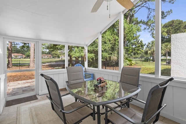 399 Linkside Dr, Miramar Beach, FL 32550 - sunroom / solarium featuring a ceiling fan, vaulted ceiling, and outdoor dining area